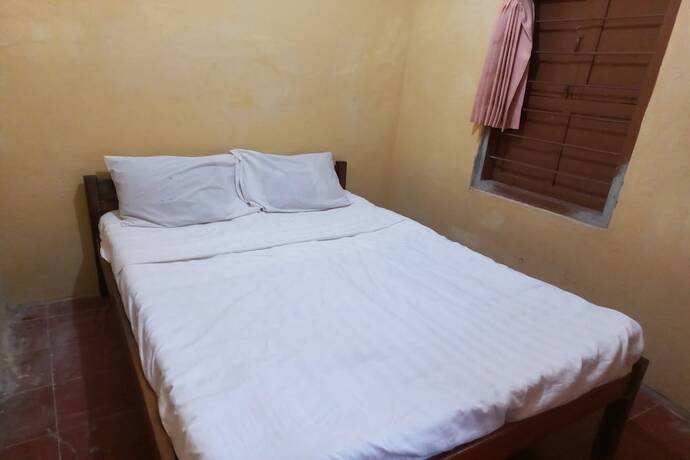 Imagen de la habitación del Hotel Spot On 93539 Juan Guest House. Foto 24