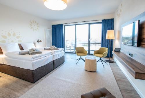 Imagen de la habitación del Hotel Spreewelten. Foto 8