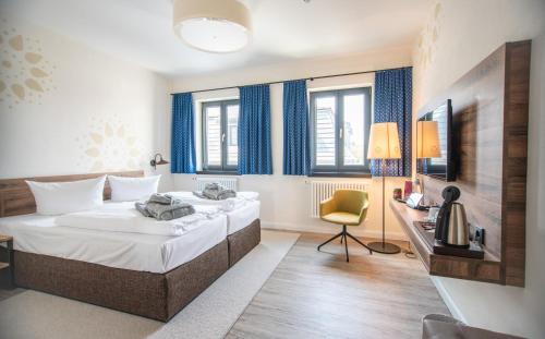 Imagen de la habitación del Hotel Spreewelten. Foto 9