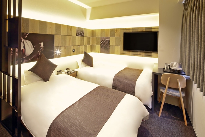 Imagen de la habitación del Hotel S-presso Namba. Foto 11