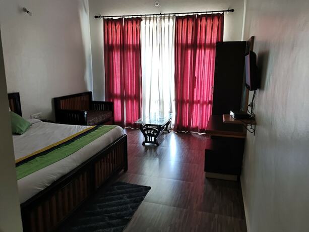Imagen de la habitación del Hotel Spring Birds, Nainital. Foto 13
