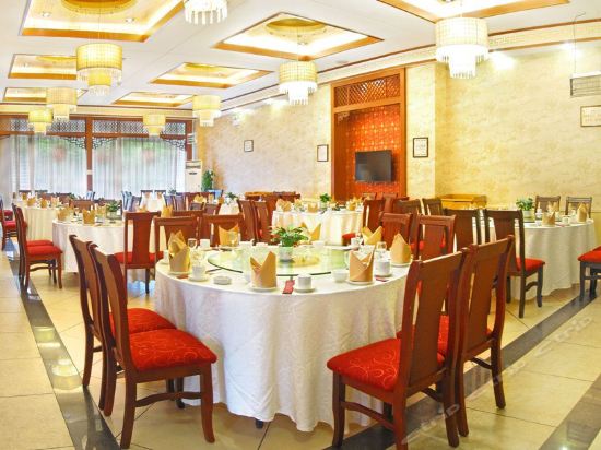 Imagen del bar/restaurante del Hotel Spring City Garden Hotel. Foto 11
