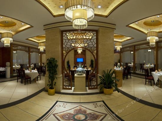 Imagen del bar/restaurante del Hotel Spring City Garden Hotel. Foto 13