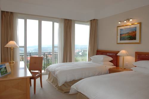 Imagen de la habitación del Hotel Spring City Golf And Lake Resort. Foto 5