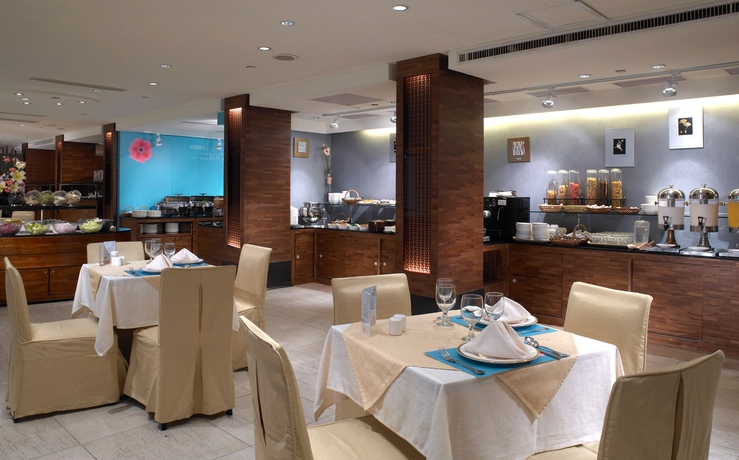 Imagen del bar/restaurante del Hotel Spring City Resort. Foto 3