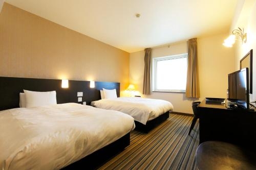 Imagen de la habitación del Hotel Spring Sunny Nagoya Tokoname. Foto 6