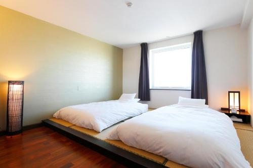 Imagen de la habitación del Hotel Spring Sunny Nagoya Tokoname. Foto 8