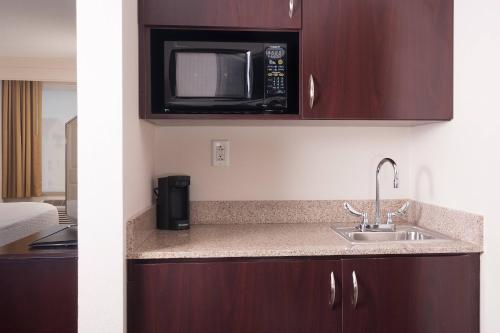 Imagen de la habitación del Hotel Springhill Suites By Marriott Orlando Airport. Foto 20