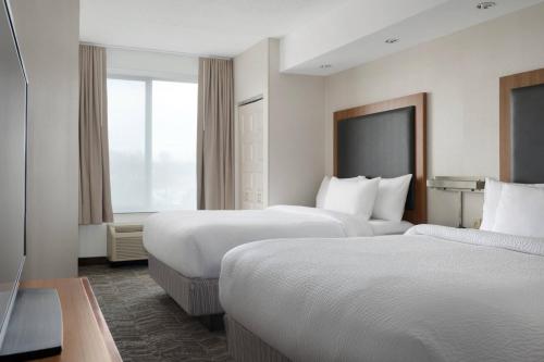 Imagen de la habitación del Hotel Springhill Suites By Marriott Syracuse Carrier Circle. Foto 19