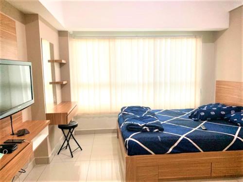 Imagen de la habitación del Hotel Springlake Apartment Summarecon by Veeroom by Zuzu. Foto 5