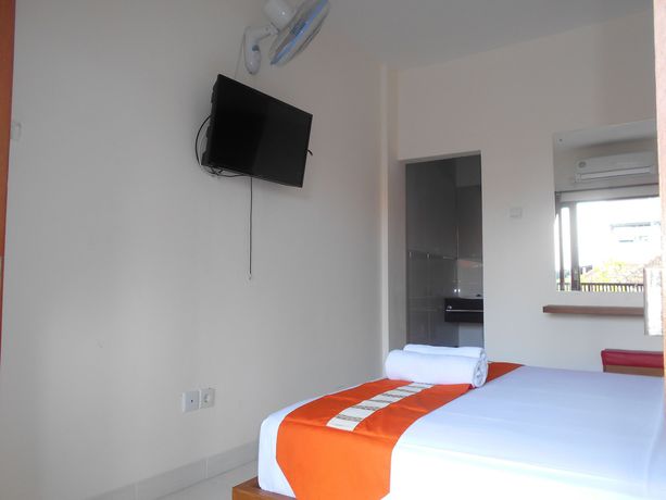 Imagen de la piscina del Hotel Spunky Premiere Kuta. Foto 15
