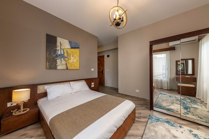 Imagen de la habitación del Hotel Squad 101, world-class military-themed fitness and weight loss boot camp/retreat/hotel. Foto 15