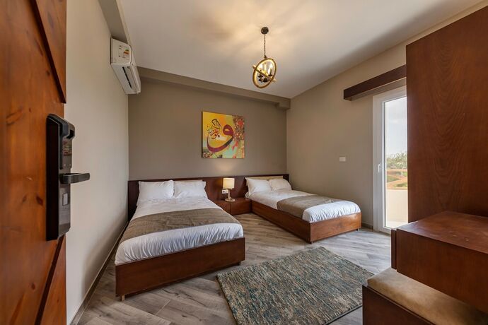 Imagen de la habitación del Hotel Squad 101, world-class military-themed fitness and weight loss boot camp/retreat/hotel. Foto 20