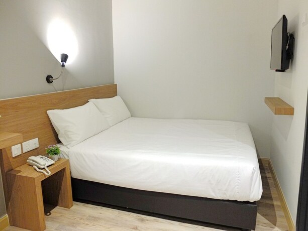 Imagen de la habitación del Hotel Square Inn. Foto 15