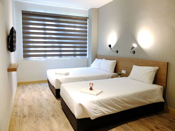 Imagen de la habitación del Hotel Square Inn. Foto 17