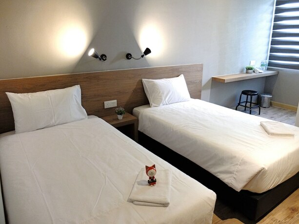 Imagen de la habitación del Hotel Square Inn. Foto 18