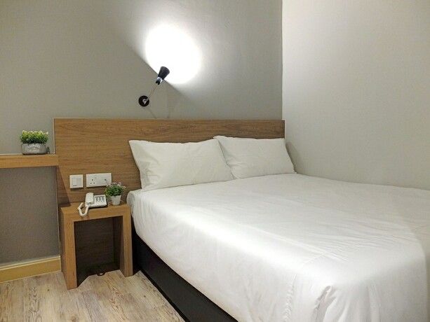 Imagen de la habitación del Hotel Square Inn. Foto 19