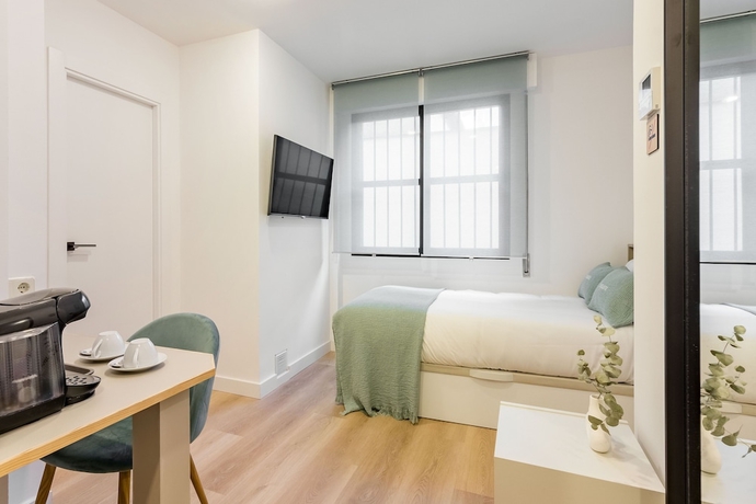 Imagen de la habitación del Hotel Square Rooms by Charming. Foto 10