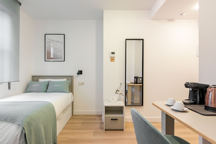 Imagen de la habitación del Hotel Square Rooms by Charming. Foto 11