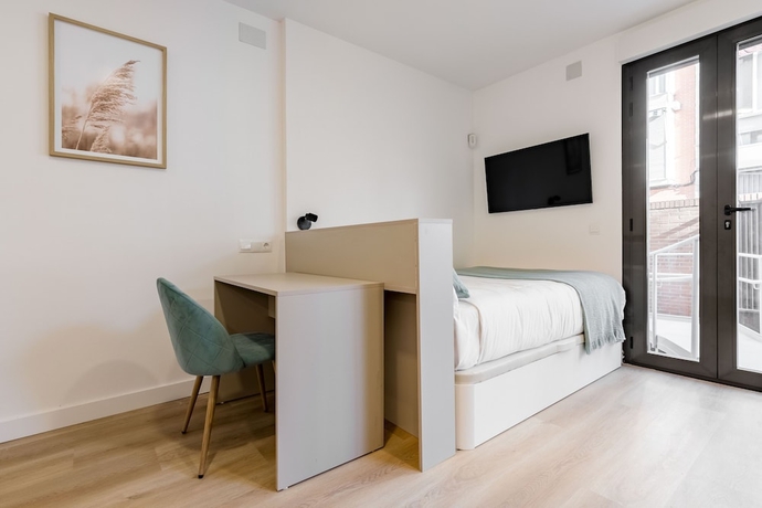 Imagen de la habitación del Hotel Square Rooms by Charming. Foto 12