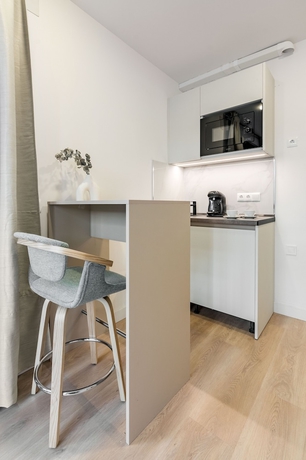 Imagen de la habitación del Hotel Square Rooms by Charming. Foto 13