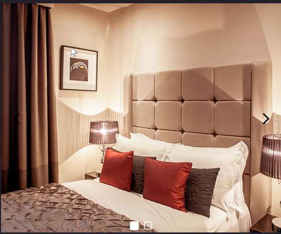 Imagen de la habitación del Hotel Square Townhouse. Foto 8