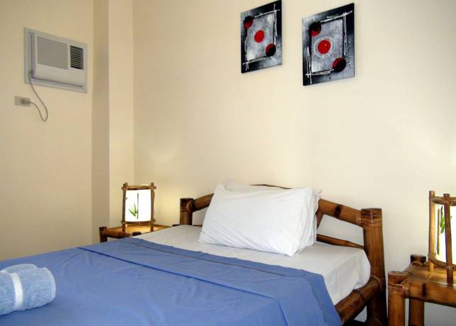 Imagen de la habitación del Hotel Squares Cafe and Apartments. Foto 4