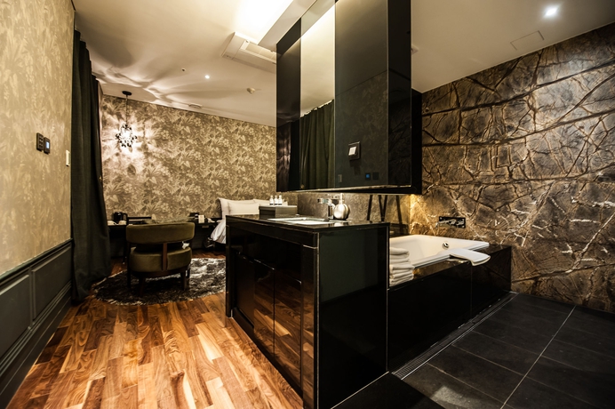 Imagen de la habitación del Hotel Sr Sadang. Foto 5