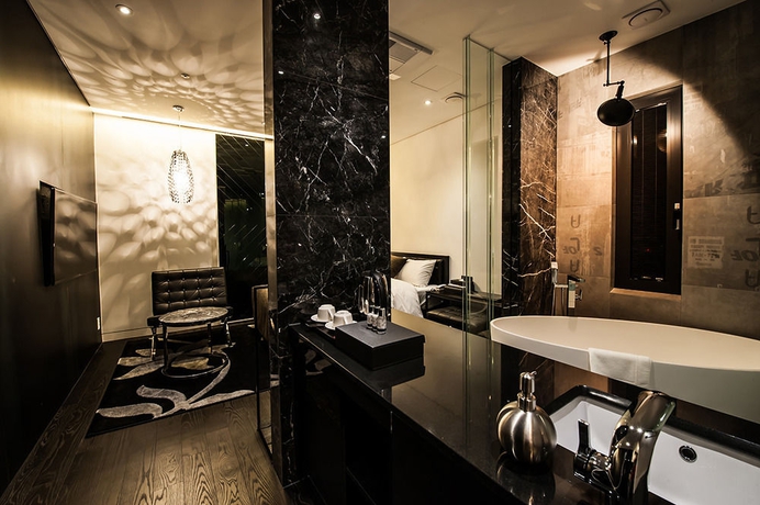 Imagen de la habitación del Hotel Sr Sadang. Foto 8