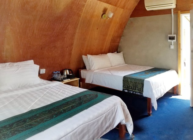 Imagen de la habitación del Hotel Sre Ambil Resort. Foto 17