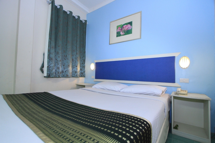 Imagen de la habitación del Hotel Sri Isan. Foto 11