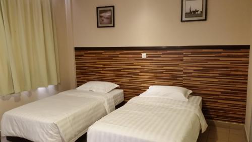 Imagen de la habitación del Hotel Sri Iskandar. Foto 4