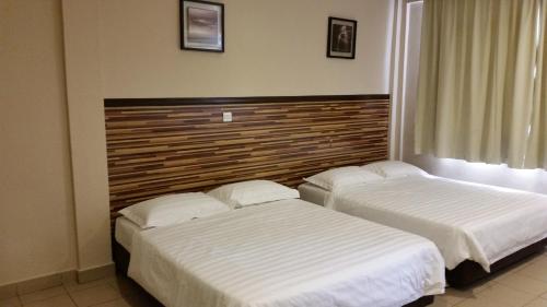 Imagen de la habitación del Hotel Sri Iskandar. Foto 5