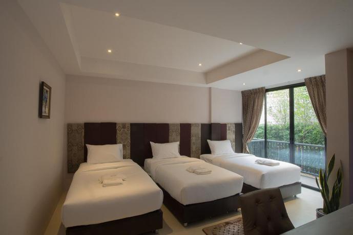 Imagen de la habitación del Hotel Sri Ngachang House. Foto 6