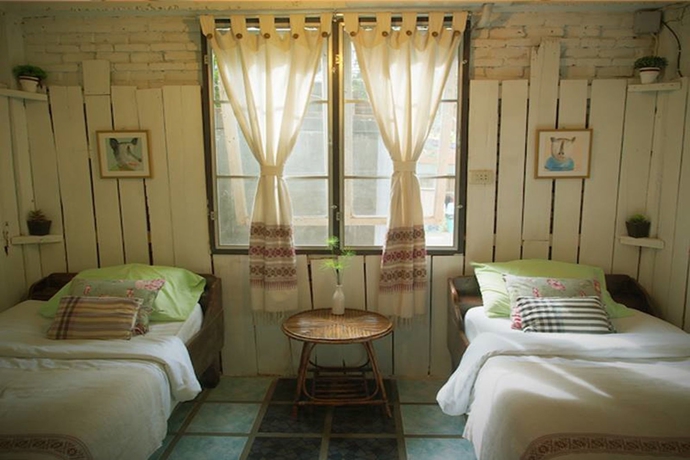 Imagen de la habitación del Hotel Srinual Lodge. Foto 9