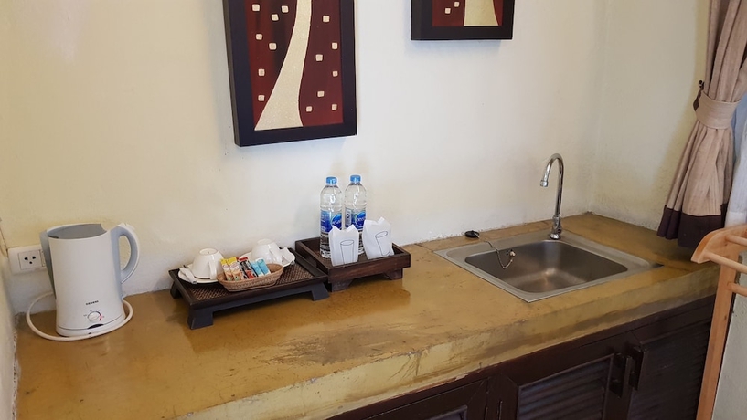 Imagen de la habitación del Hotel Sri-ping Resort. Foto 11