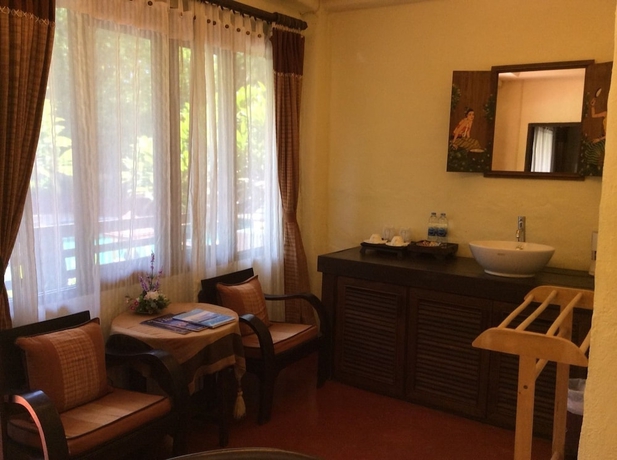 Imagen de la habitación del Hotel Sri-ping Resort. Foto 14