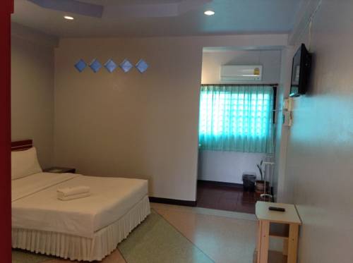 Imagen de la habitación del Hotel Srisomthai. Foto 3