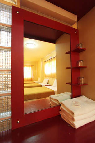 Imagen de la habitación del Hotel Srisomthai. Foto 13