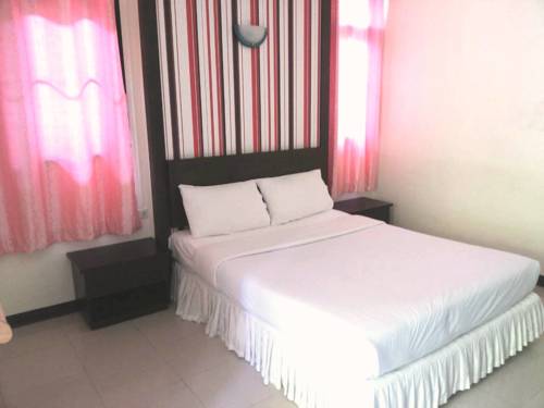 Imagen de la habitación del Hotel Srisomthai. Foto 16