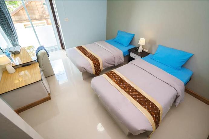 Imagen de la habitación del Hotel Sritrang Place. Foto 7
