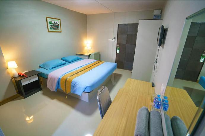 Imagen de la habitación del Hotel Sritrang Place. Foto 8