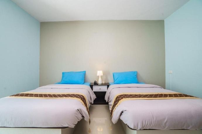 Imagen de la habitación del Hotel Sritrang Place. Foto 9