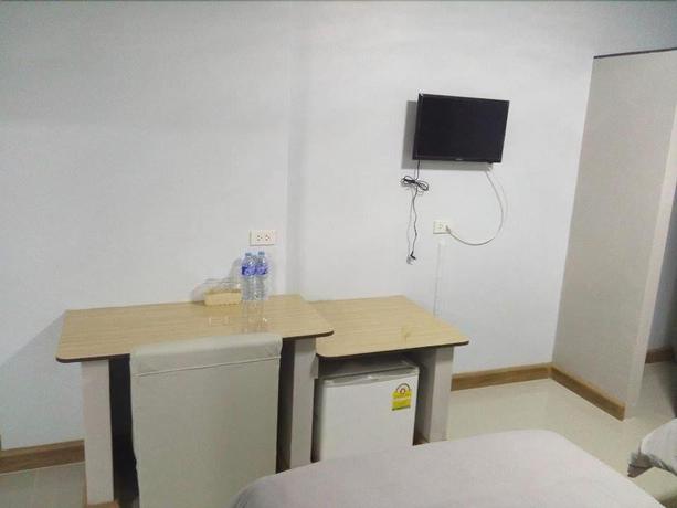 Imagen de la habitación del Hotel Sritrang Place. Foto 10