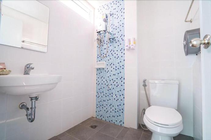 Imagen de la habitación del Hotel Sritrang Place. Foto 12
