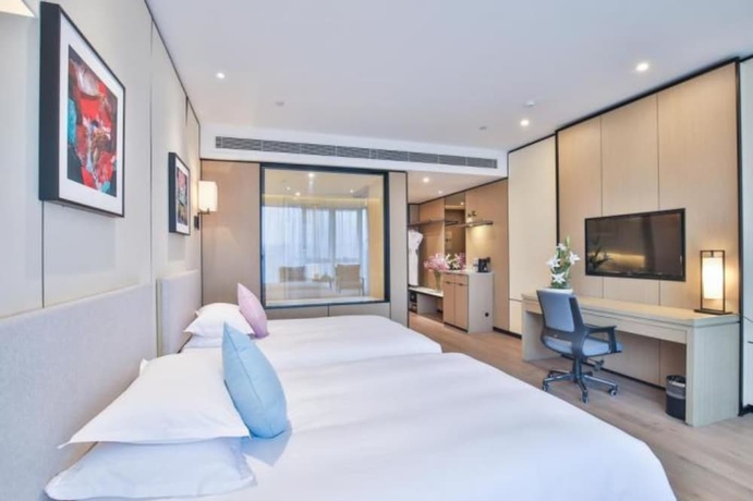 Imagen de la habitación del Hotel Ssaw Boutique Wenzhou. Foto 6