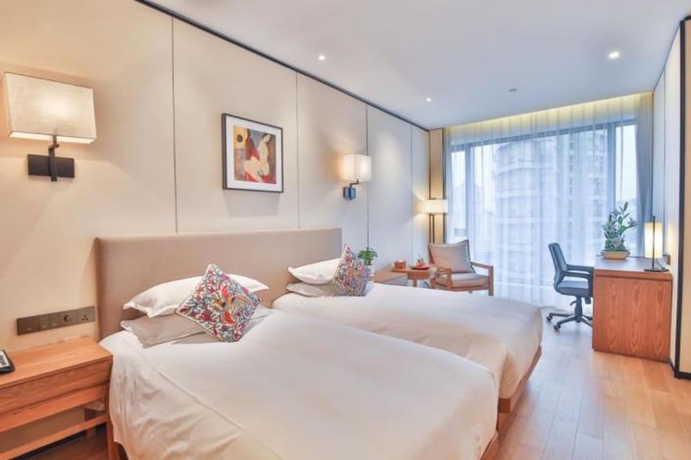 Imagen de la habitación del Hotel Ssaw Boutique Wenzhou. Foto 10
