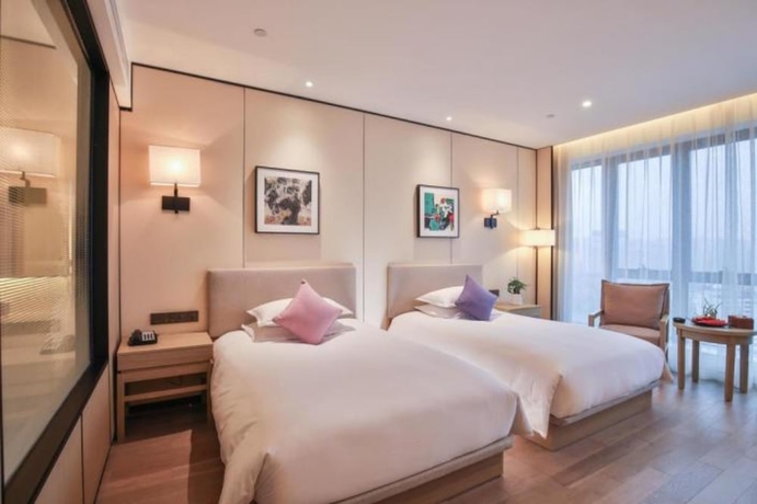 Imagen de la habitación del Hotel Ssaw Boutique Wenzhou. Foto 13