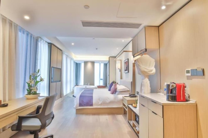 Imagen de la habitación del Hotel Ssaw Boutique Wenzhou. Foto 16