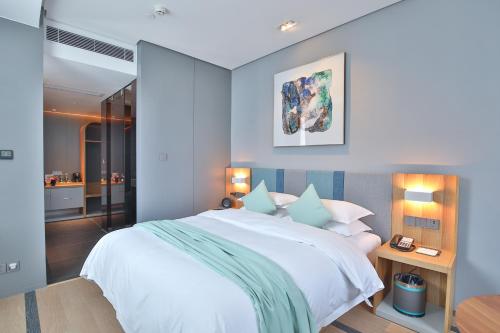 Imagen de la habitación del Hotel Ssaw Pagoda Shanghai. Foto 6